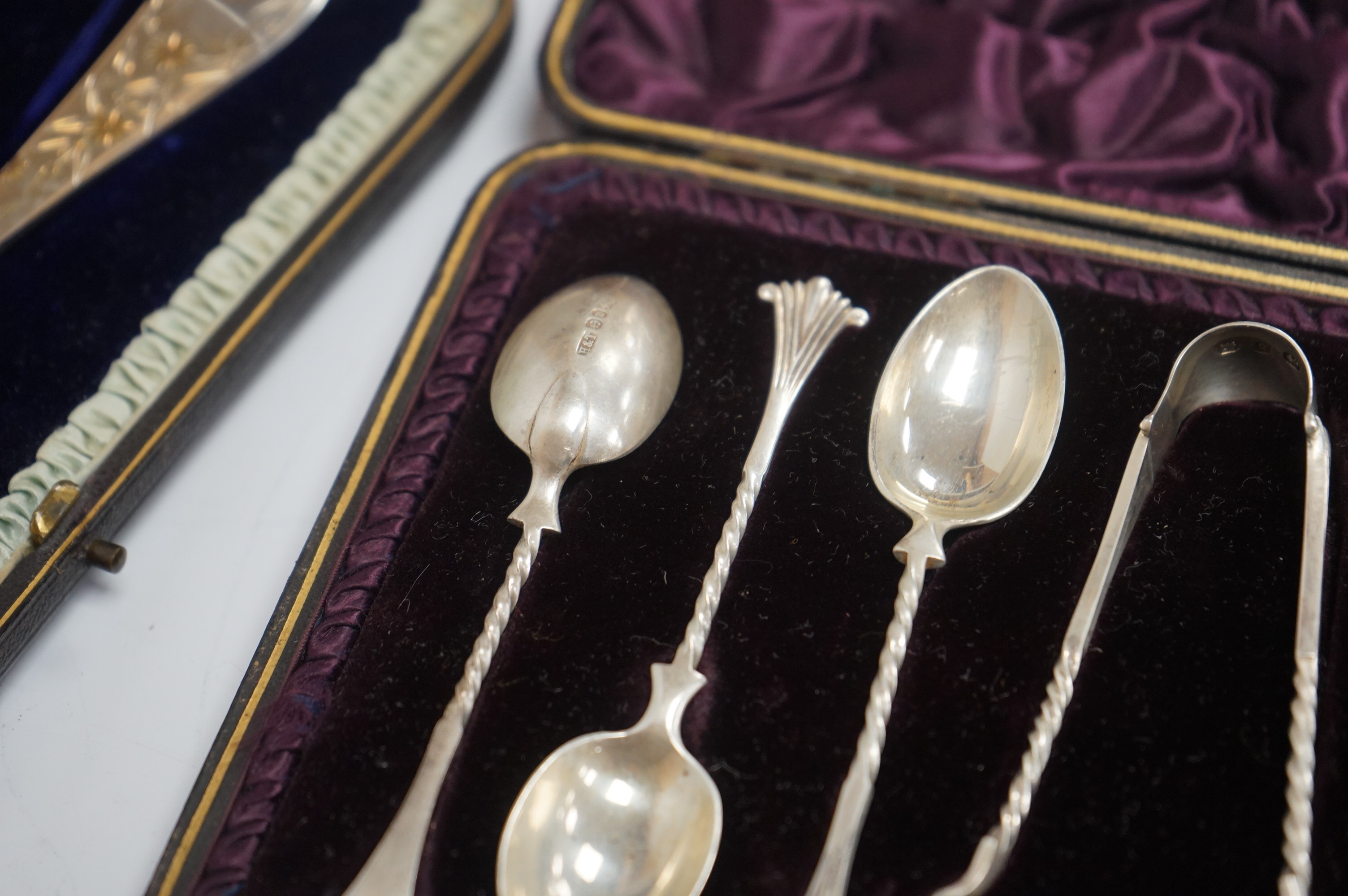 A cased pair of Victorian silver serving spoons and matching sifter spoon with engraved floral decoration, Atkin Brothers, Sheffield, 1888, together with a cased set of six late Victorian silver coffee spoons and matchin